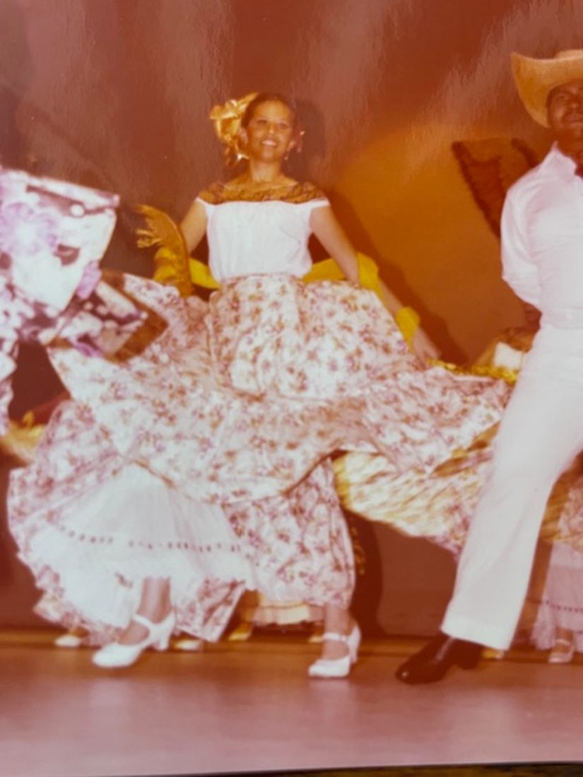 Sylvia dancing in folklórico dress