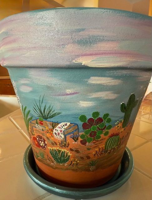 Painted pot with a sunset desert scene, side 2