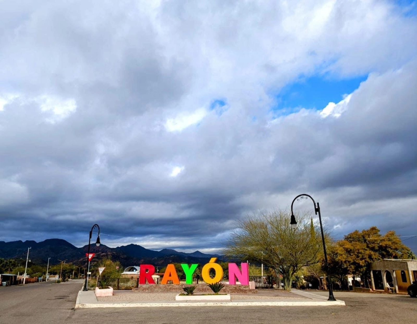 Rayón entrance sign with rainbow colored letters
